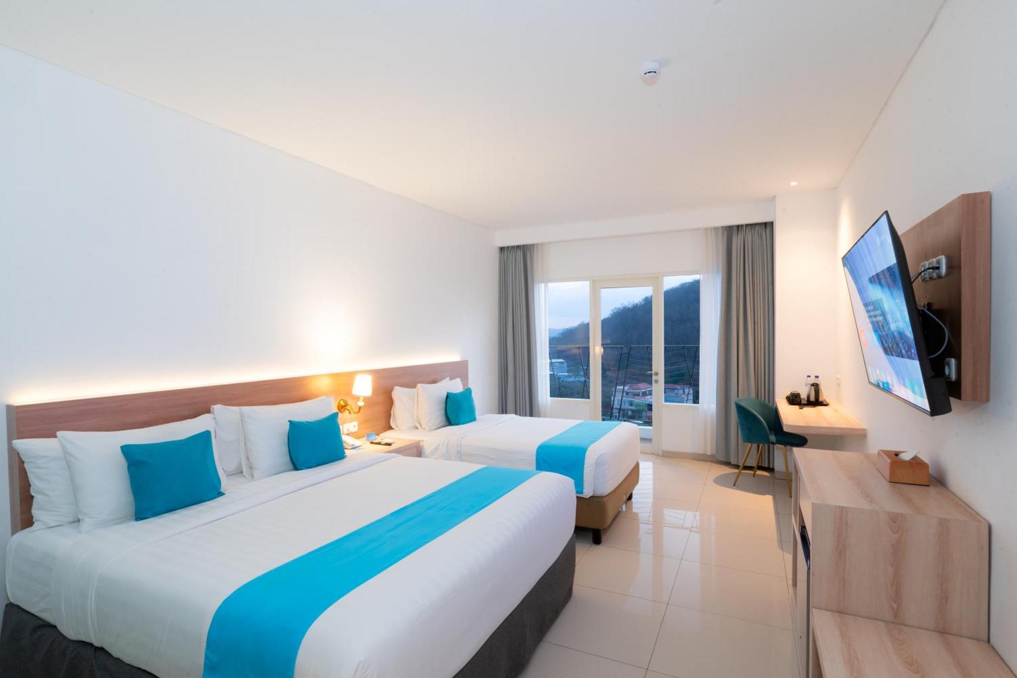 Zasgo Hotel Лабуан-Бахо Экстерьер фото